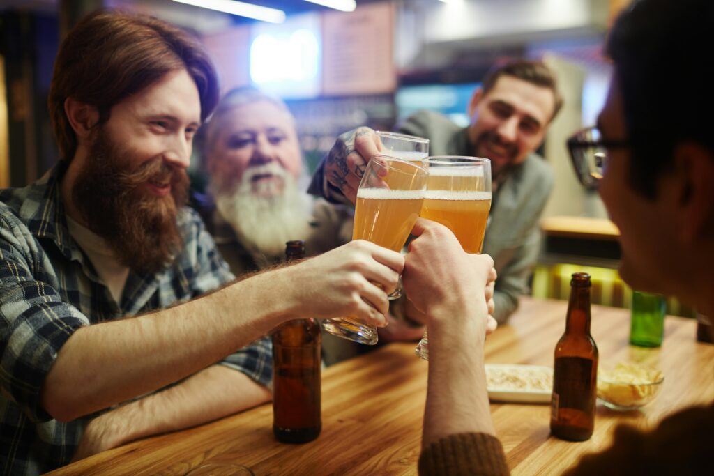 Guests enjoying local beers in a lounge on a beer river cruise in Europe 